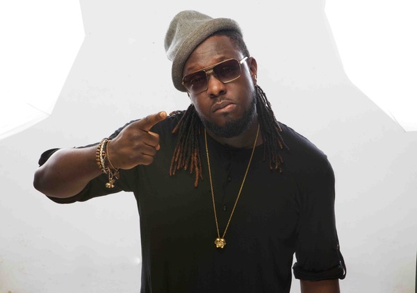 http://www.bellanaija.com/wp-content/uploads/2014/12/Timaya-on-BellaNaija.com-01.jpg