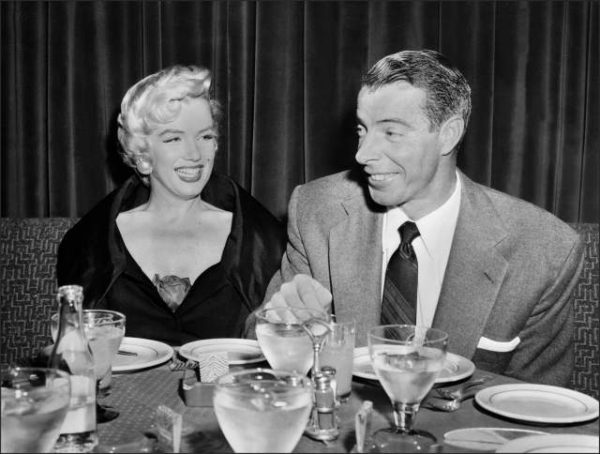 SAN FRANCISCO, UNITED STATES:  Picture dated of the fifties showing American actress Marilyn Monroe (L) with her husband baseball legend Joe DiMaggio. (Photo credit should read AFP/AFP/Getty Images)
