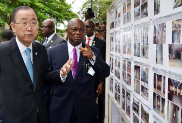 PIC. 2. THE SECRETARY-GENERAL OF UNITED NATIONS (UN), MR BAN KIMOON (L) AND PERMANENT SECRETARY, FCT, MR JOHN CHUKWU, INSPECTING A PHOTO MONTAGE, BEING RECORD OF UNITED NATIONS BUILDING BOMBED THROUGH A CAR EXPLOSION IN AUGUST 2011, AT THE SITE IN ABUJA ON TUESDAY (24/8/15). 6134/24/8/2015/BJO/NAN