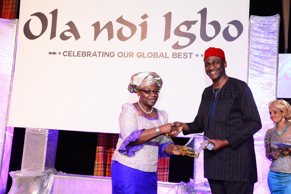 Oby Ezekwesili presenting an Award to Nnaeto Orazulike