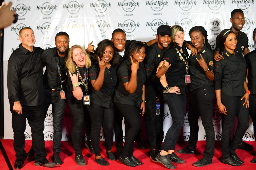 Hard Rock Cafe Lagos Launch BellaNaija Sanjay Mahtani, Co-Founder & Executive Director SJM Ventures LTD with staff of Hard Rock Café Lagos