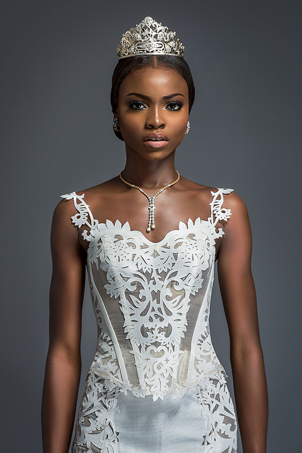 Liya - Ivory boned corset with diaphanous divides and Ivory “winged” skirt. Corset and skirt panelled with Komole Kandids Forest motif.
