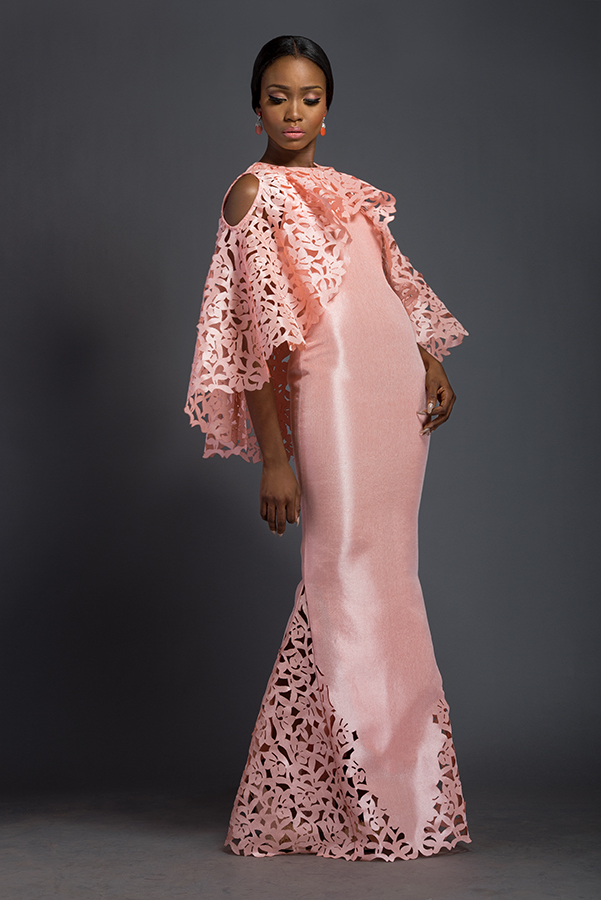Elizabeth - Cherry blossom pink floor length dress with fringe fascia cape. Fringe fascia cape is patterned with Komole Kandids Azalea motif, and skirt is panelled with Komole Kandids Azalea motif.