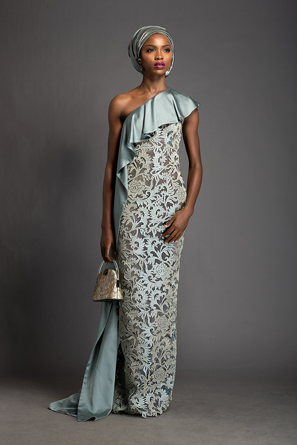 Imani - One shoulder celadon floor length dress with attached ruched ‘ipele’. Dress patterned with Komole Kandids Forest motif.