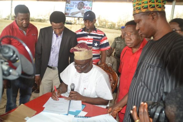 Gov Fayose during the signing of the Bill