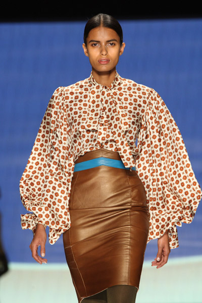 Printed blouson-sleeved shirt and leather skirt (Lakshmi, India)