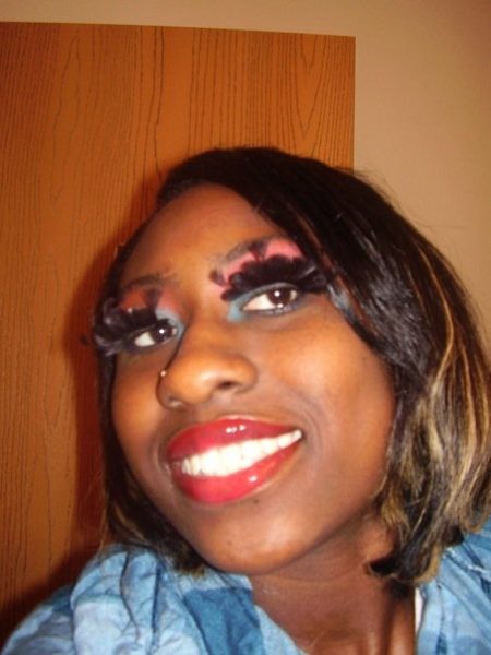 My alter ego Cha Cha..LOL..Red lipstick and Mary Kay eye shadow in rust and teal, plus crazy eye lashes.