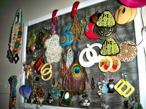 Part of my earring collection; violins, doilies, cowries, etc :D