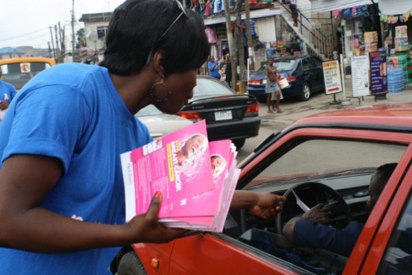 Handing out leaflets