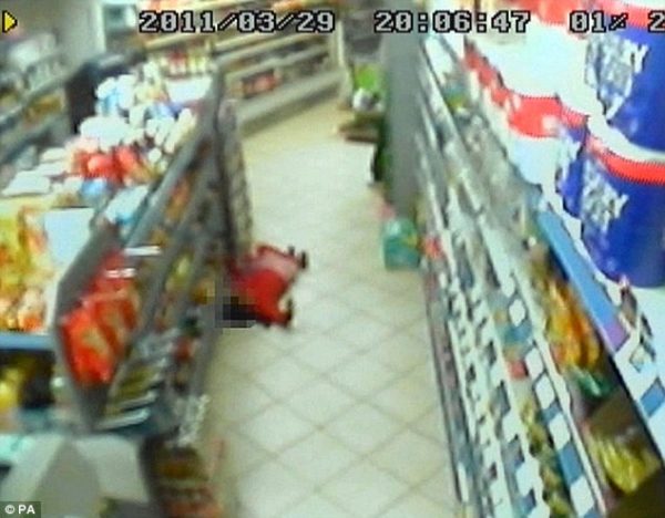 CCTV still showing Thusha lying on the floor having being shot in the chest