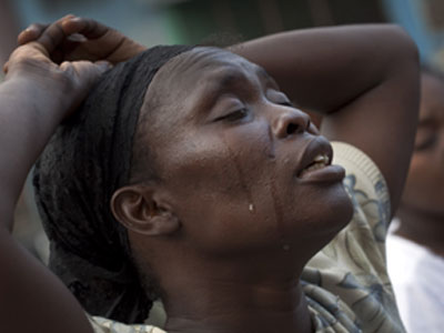 https://www.bellanaija.com/wp-content/uploads/2012/09/haiti-woman-crying.jpg