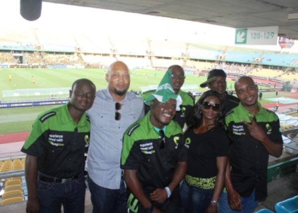 Plato Syrimis(Etisalat Director of Customer Care) (second left) and Etisalat customers at the Royal Bafokeng Stadium before the Nigeria v Ethiopia match