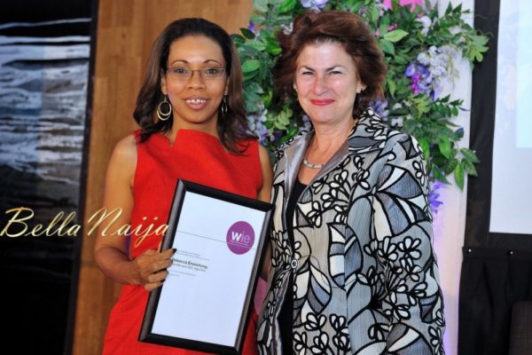 Rebecca Enonchong receiving the WIE 60 Power Influencer Award from Dame Nicola Brewer