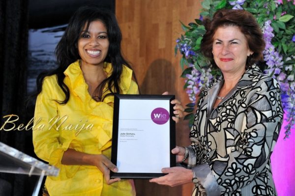 Julie Gichuru receiving the WIE 60 Power Influencer Award from Dame Nicola Brewer