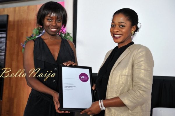 Dee Poku presenting Folake Folarin-Coker with the WIE Enterprise Award.