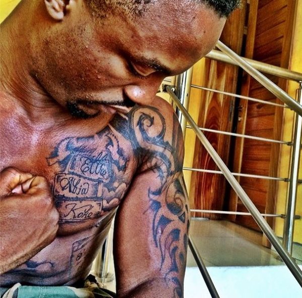 Iyanya Tattoo - February 2014 - BellaNaija