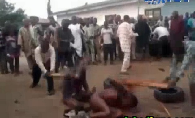 HORRIFIC: 2 Alleged Gay Nigerian Men Beaten to DEATH as Policemen &  Passersby Watch | BellaNaija