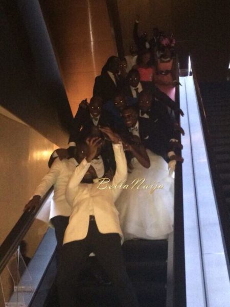 Aww! The bride, groom and wedding party cheese it up for an Oscar selfie on the way to the reception.