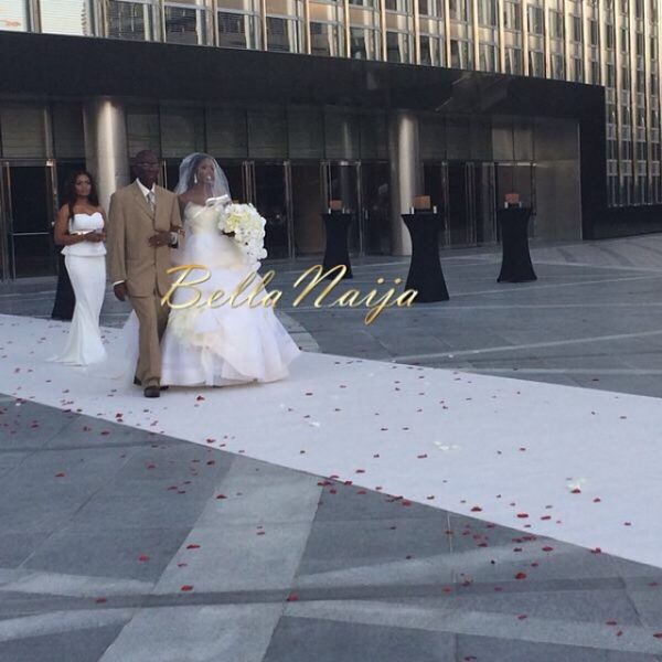 Tiwa & her dad walking down the aisle