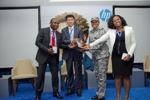 The Assistant Comptroller-General, Nigeria Customs Services (NCS), Ms. Adeyemo Grace receiving the Recognition Award for their commitment to the fight against counterfeits in Nigeria
