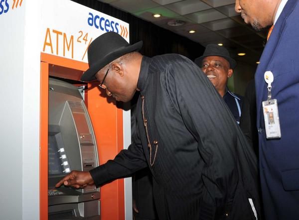 Jonathan unveils E-ID Card- August - 2014 - BellaNaija002