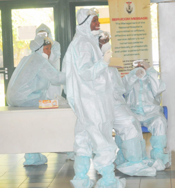 PIC.5. HEALTH PERSONNEL IN PROTECTIVE  KITS IN ABUJA