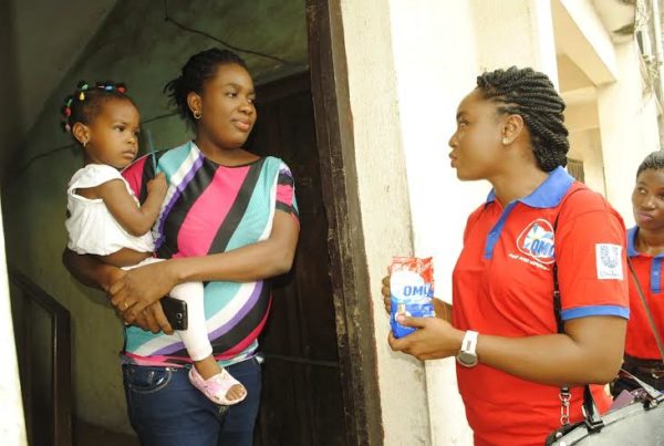 Chioma Akpotha in a neighborhood in Aba