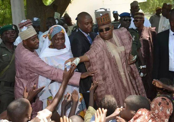 Borno governor distributes money to children