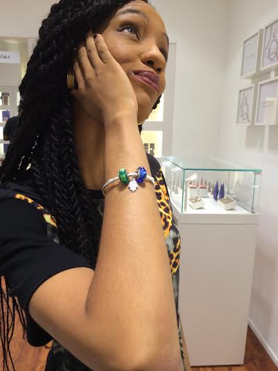 Recording artist Di'Ja shows off her bracelet - "Everyone knows I love my green"