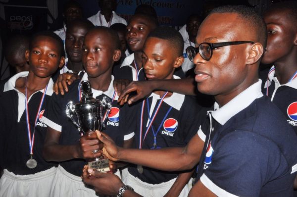 Brand Manager, Seven-Up Bottling Company, Mr. Segun Ogunleye(1st Right) and awardees during the Pepsi Football Academy’s  Gala Night in Lagos at the weekend