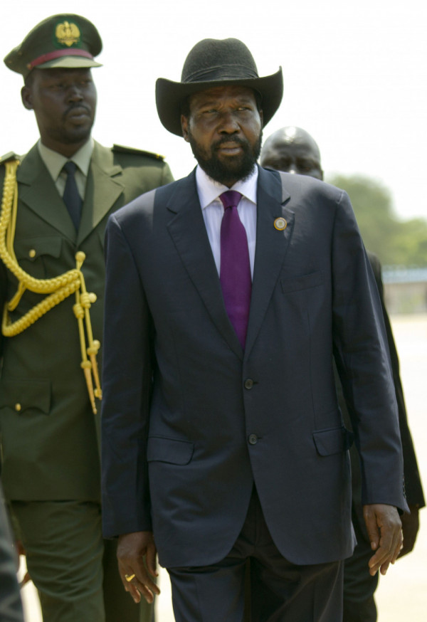 JUBA, SOUTH SUDAN - JULY 9:  South Sudan's first president, Salva Kiir is escorted by security during a ceremony celebrating South Sudan's first Independence day on July 9, 2012 in Juba, South Sudan. After breaking away from Sudan last year, South Sudan is getting ready for its first independence anniversary celebrations. Over the past year repeated conflict with North Sudan, corruption scandals and economic difficulties have plagued the new country. Further problems caused by the shutdown of its oil production have led to a sharp decline in its currency and a rise in the price of food and fuel. (Photo by Paula Bronstein/Getty Images)