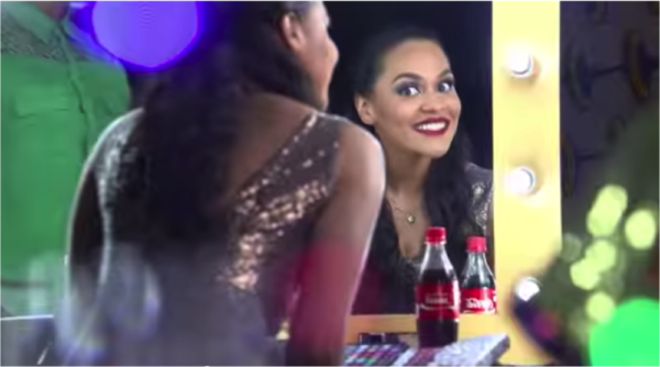 Tania Omotayo share a coke