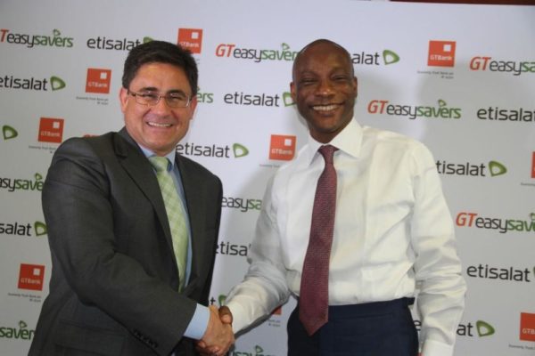 Chief Executive Officer, Etisalat Nigeria, Matthew Willsher; Managing Director and CEO of Guaranty Trust Bank Plc, Segun Agbaje