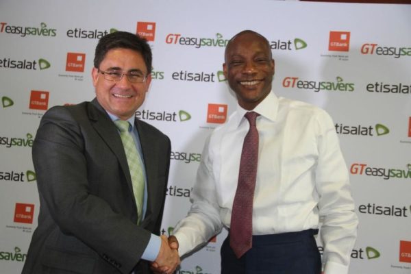 Chief Executive Officer, Etisalat Nigeria, Matthew Willsher; Managing Director and CEO of Guaranty Trust Bank Plc, Segun Agbaje 