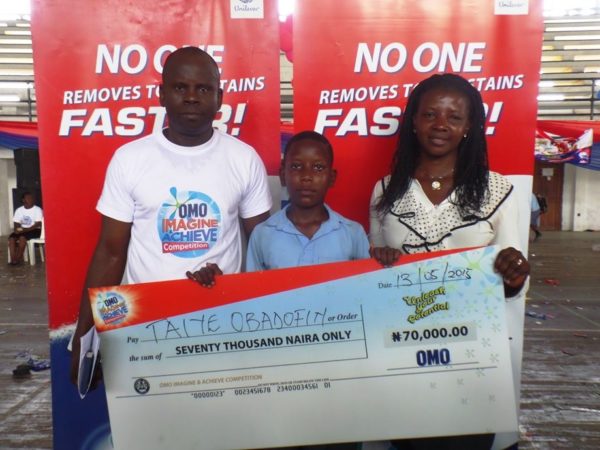 Coordinator, Children of Africa, Kunle Alaba; Omo Imagine and Achieve Art Competition first runner-up, Taiye Obadofin and Mrs Obadofin at the Lagos State finals of the Omo Imagine and Achieve competition.