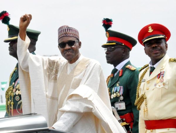 PIC.6. PRESIDENT MUHAMMADU BUHARI ACKNOWLEDGING CHEERS DURING HIS INAUGURATION IN ABUJA ON FTIDAY(29/5/15). 2819/29/5/2015/CH/NAN