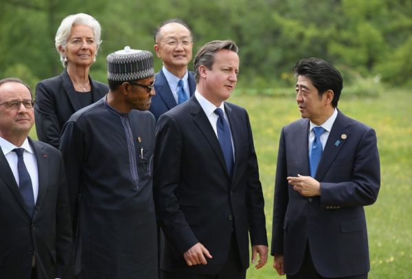 GARMISCH-PARTENKIRCHEN, GERMANY - JUNE 08:  (From L to R) French President Francois Hollande, International Monetary Fund (IMF) Managing Director Christine Lagarde, Nigerian President Muhammadu Buhari, President of the World Bank Group Jim Yong Kim, British Prime Minister David Cameron and Japanese Prime Minister Shinzo Abe arrive for the Outreach group photo on the second day of the summit of G7 nations at Schloss Elmau on June 8, 2015 near Garmisch-Partenkirchen, Germany. In the course of the two-day summit G7 leaders are scheduled to discuss global economic and security issues, as well as pressing global health-related issues, including antibiotics-resistant bacteria and Ebola.  (Photo by Sean Gallup/Getty Images)