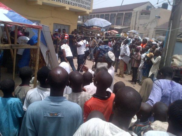 The excited crowds looks on as Challenger X and Omo Fast Action start the stain removing challenge