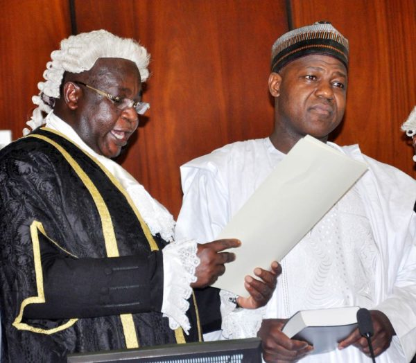 PIC.12.CLERK OF THE NATIONAL ASSEMBLY, SALISU MAIKASUWA (L) SWEARINNG-IN THE SPEAKER OF THE HOUSE OF REPRESENTATIVES, REP. YAKUBU DOGARA AT THE INAUGURATION OF THE 8TH NATIONAL ASSEMBLY IN ABUJA ON TUESDAY (9/6/15). 3012/9/6/2015/CH/BJO/NAN