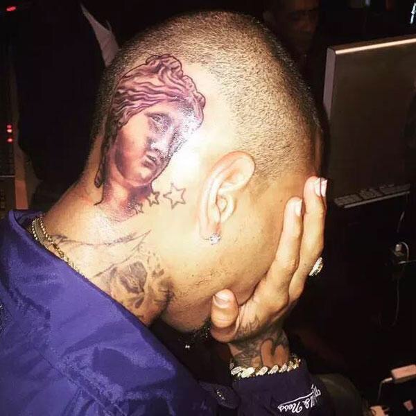Chris Brown Tattoo - BellaNaija - August 2015001