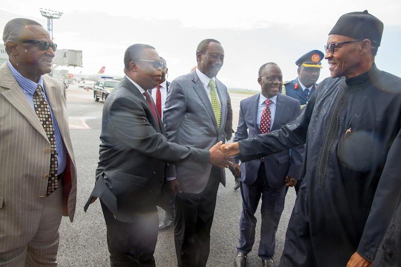 President Buhari greets some members of his delegation including Perm. Sec. Ministry of Foreign Affairs Amb. Bulus Z. Lolo, National Security Adviser Rtd Maj. Gen. Babagana Monguno, DG. NIA Amb. Ayodele Oke, Chief of Defence Intelligence AVM Monday Morgan