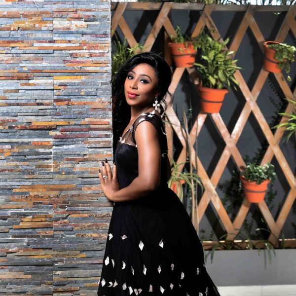 Dakore Akande as Tola