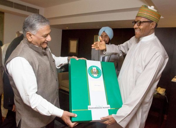 PIC. 32. PRESIDENT MUHAMMADU BUHARI (R), PRESENTING A GIFT TO GEN.VIJAY KUMAR SINGH, DURING PRESIDENT BUHARIS MEETING WITH GEN. SINGH AND SOME OF HIS SENIOR ALUMNI, DURING THE 3RD INDIA-AFRICA FORUM SUMMIT, IN NEW DELHI, INDIA ON WEDNESDAY (28/10/15). 3898/28/10/2015/ICE/BJO/NAN