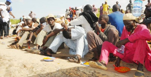 PIC.1.NIGERIAN RETURNEES FROM CENTRAL AFRICAN REPUBLIC  DUE TO CRISES IN THE  COUNTRY, EATING AT NEMA TRANSIT CAMP IN YOLA. 6986/6/10/2015/JAU/CH/NAN