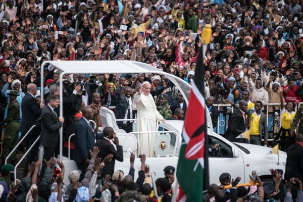 NAIROBI, KENYA - NOVEMBER 26: Pope Francis arrives at the University of Nairobi for a public mass in downtown Nairobi on November 26, 2015, in Nairobi, Kenya. Pope Francis makes his first visit to Kenya on a five day African tour that is scheduled to include Uganda and the Central African Republic. Africa is recognised as being crucial to the future of the Catholic Church with the continent's Catholic numbers growing faster than anywhere else in the world. (Photo by Nichole Sobecki/Getty Images)