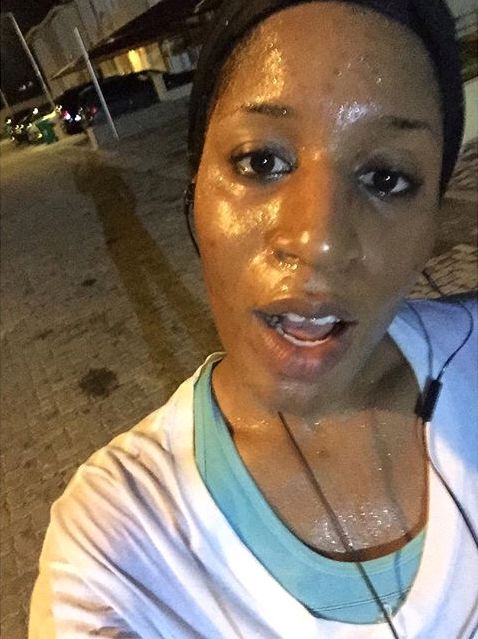 Nicole's caption: "Outchea 1) trying not to pass out 2) trying to figure out how babes on IG look so good when they workout . Momma told you, #christmasiscoming No babe is chasing me out of Lagos this year bruh! "