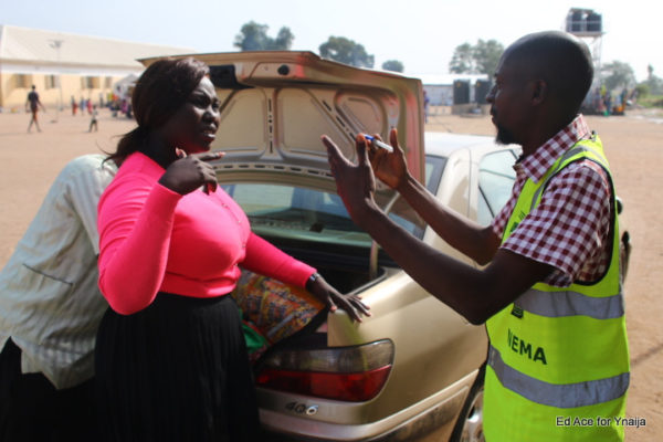 TFAA team manager, Bukonla Adebakin speaking with Mr Ibrahim of NEMA