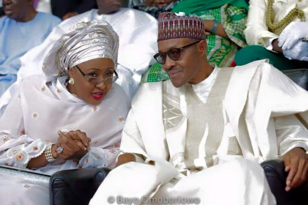 A "Yes you can call me Mr President" smile with wife Aisha at the Inauguration | Photo by Bayo Omoboriowo