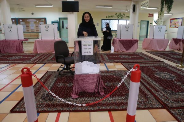 JEDDAH, SAUDI ARABIA- DECEMBER 12:  Saudi women cast their votes for the municipal elections at a polling station on December 12, 2015 in Jeddah, Saudi Arabia. Saudi Women are running the municipal council seats as candidates for the first time in the Kingdom's history and also be allowed for the first time to vote in a governmental election. The Municipal councils are the only government body in which Saudi Arabian citizens can elect representatives, so the vote is widely seen as a small but significant opening for women to play a more equal role in society.  (Photo by Jordan Pix/ Getty Images)
