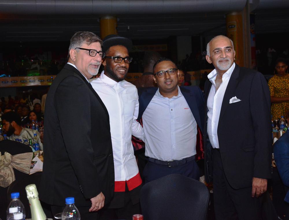 Managing Director, 7Up Bottling Co, Sunil Sawhney, Jay Jay Okocha, Head of Marketing 7UP, and a Guest